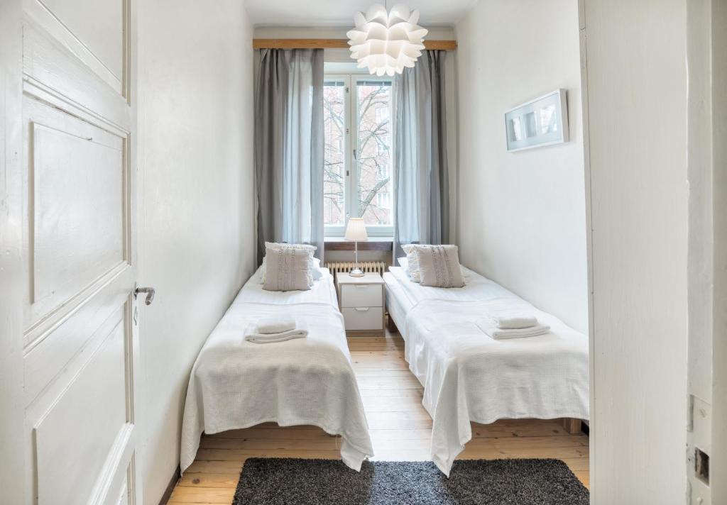 Etu-Toolo Apartment | Kotimaailma Helsinki - Runeberginkatu 17