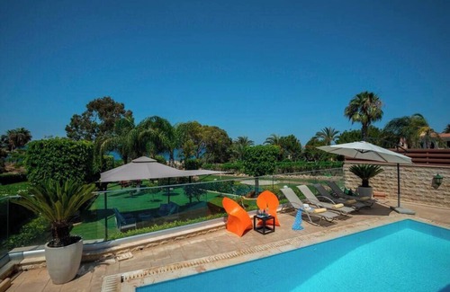 Protaras Villa | A Beachfront Villa with private Heated Pool (Additional charges apply)