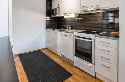 Keskinen District Apartment | Kotimaailma - Avara ja valoisa kolmio saunalla lähellä Helsingin keskustaa
