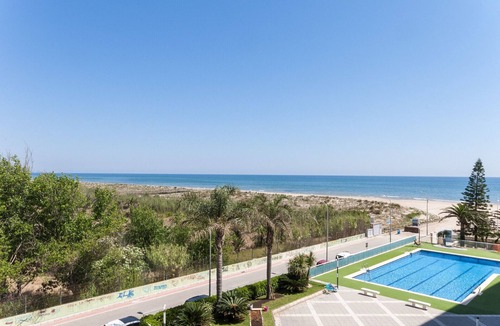 Playa de Gandia Apartment | Ocean view condo located steps from the beach. Modern decoration!