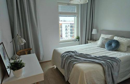 Tampere Apartment | Stylish top floor ap, with private parking, next to a tram stop