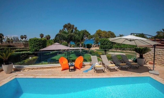 Protaras Villa | A Beachfront Villa with private Heated Pool (Additional charges apply)