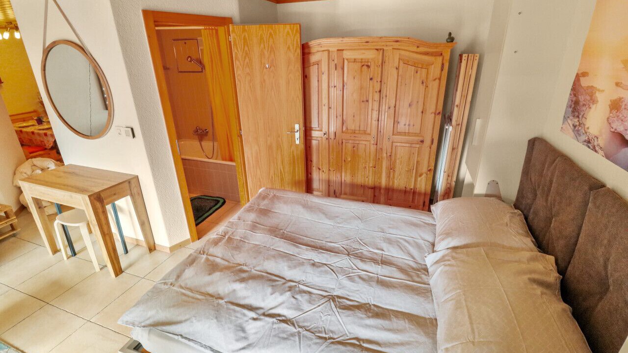 Photo of Bedroom in Lens