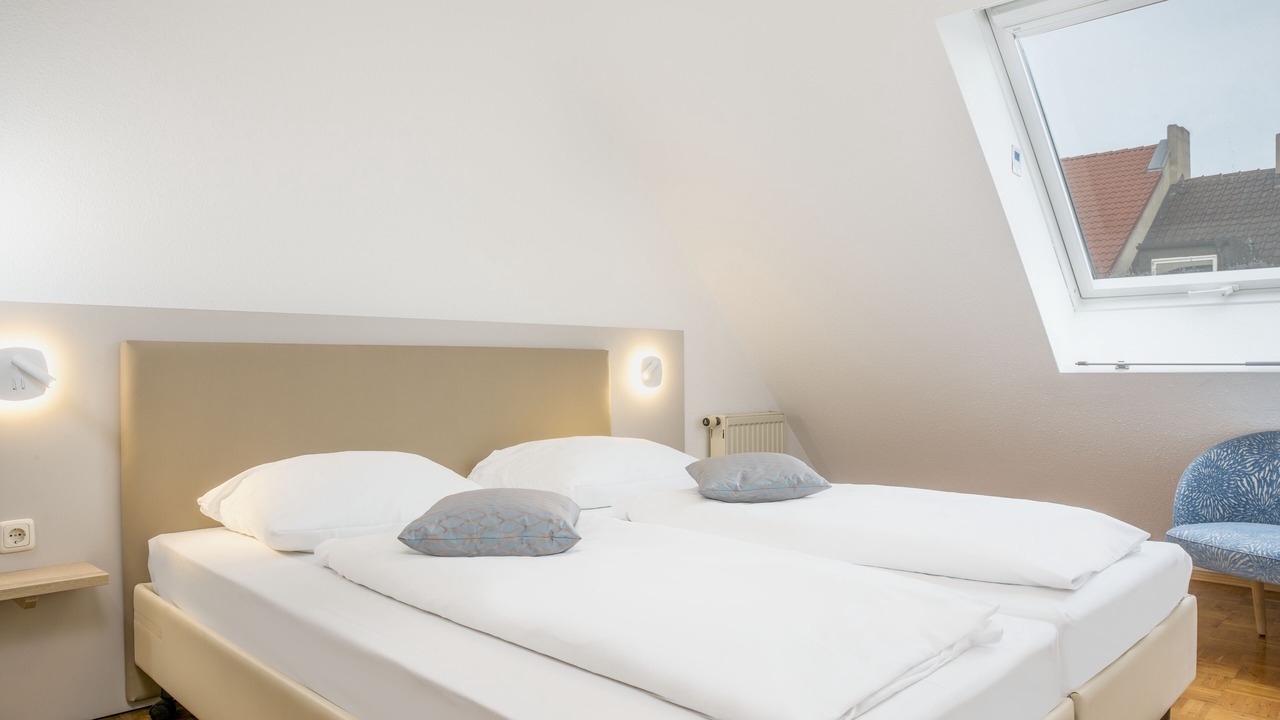Photo of Bedroom in Ludwigsvorstadt-Kliniken