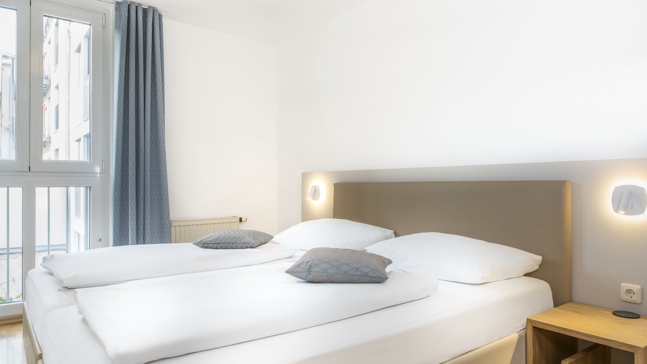Photo of Bedroom in Ludwigsvorstadt-Kliniken