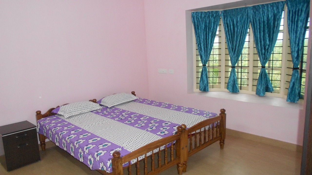 Photo of Bedroom in Thiruvananthapuram