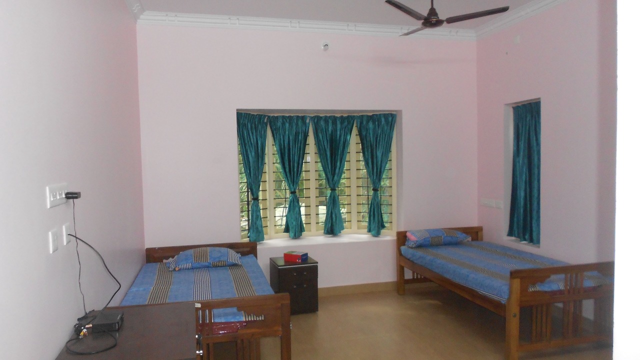 Photo of Bedroom in Thiruvananthapuram