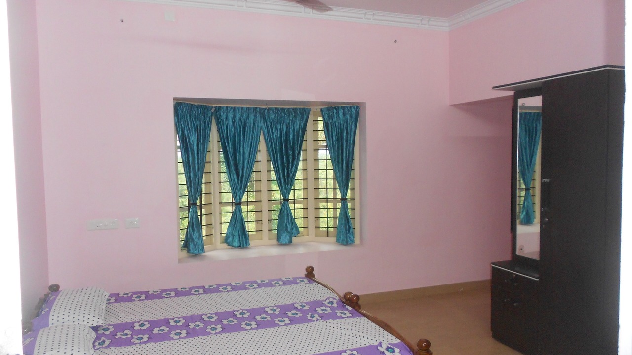 Photo of Bedroom in Thiruvananthapuram