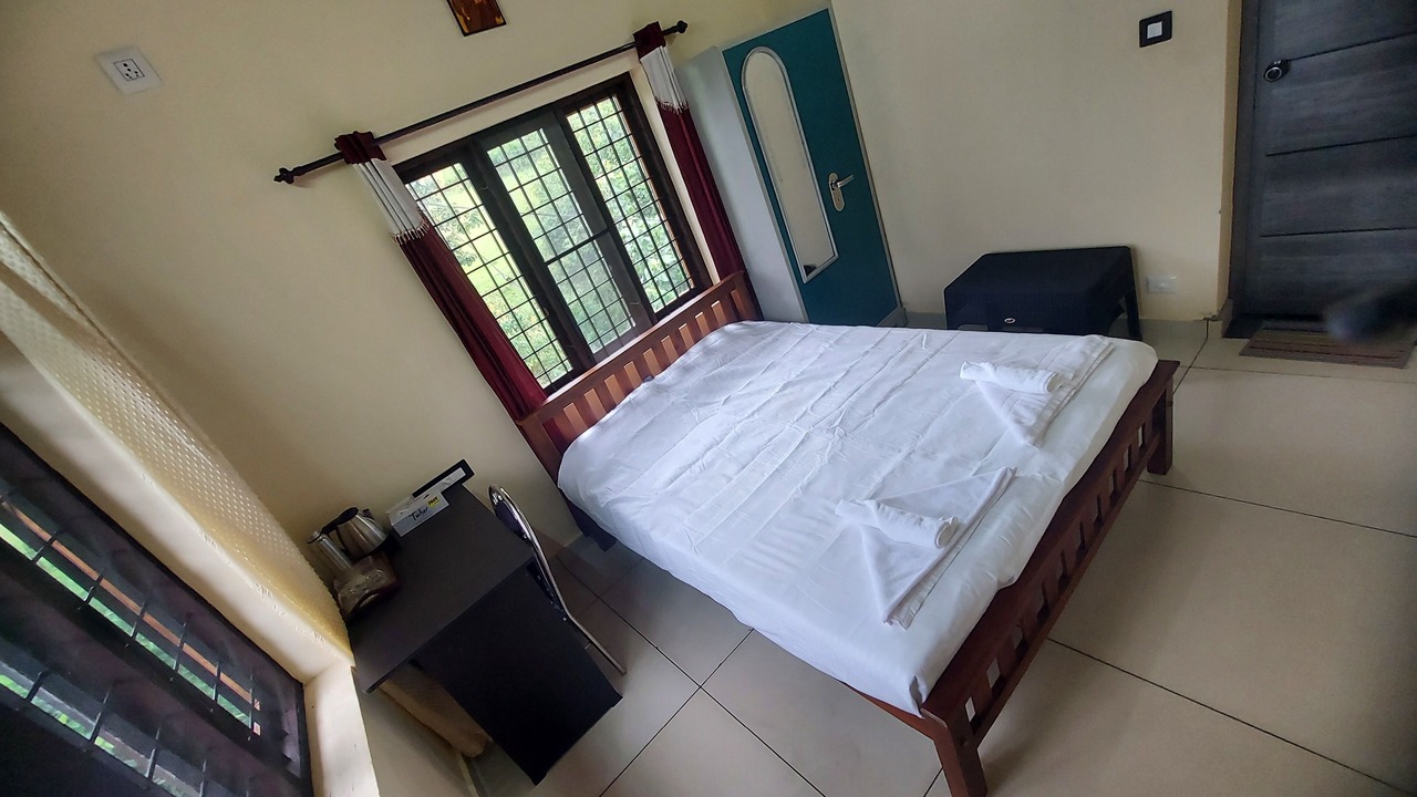 Photo of Bedroom in Mannarkkad