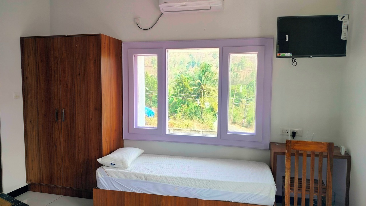 Photo of Bedroom in Mannarkkad