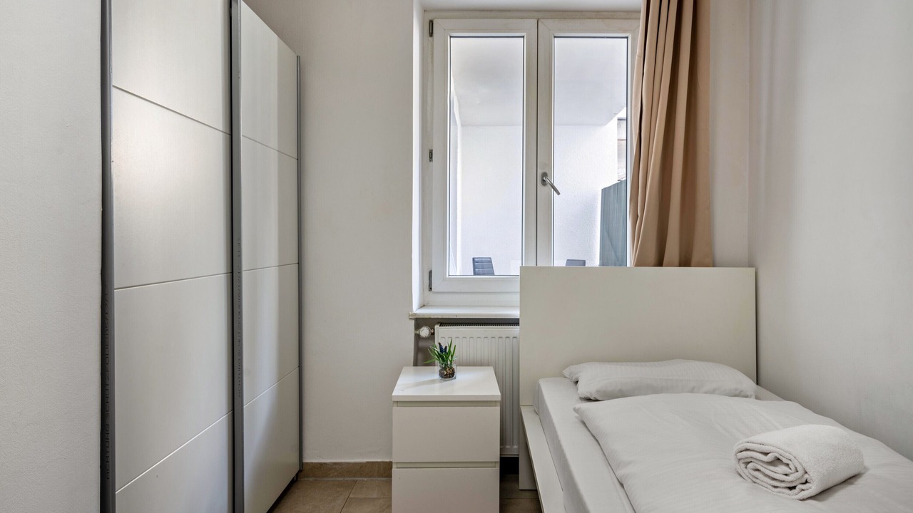 Photo of Bedroom in Ludwigsvorstadt-Kliniken