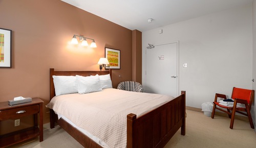 Queen Bed with Shared Bathroom