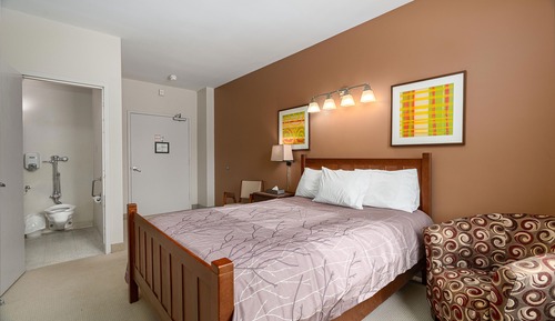 Queen Bed with Half Washroom